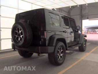 2010 Jeep Wrangler Unlimited Sport - miniatura 4