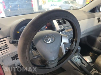 2010 Toyota Corolla - miniatura 10