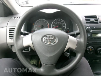 2010 Toyota Corolla CE - miniatura 11