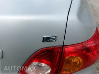 2010 Toyota Corolla CE - miniatura 21