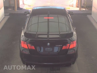 2011 BMW 5 Series Sedan 550i xDrive - miniatura 5