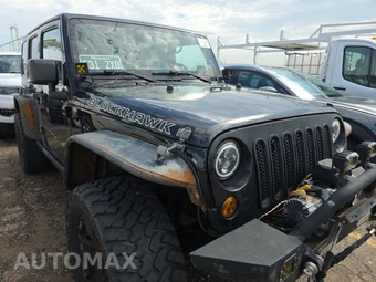 2011 Jeep Wrangler Unlimited Rubicon – miniatura 3