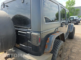 2011 Jeep Wrangler Unlimited Rubicon – miniatura 4