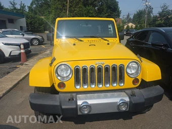 2011 Jeep Wrangler Unlimited Sahara - miniatura 2