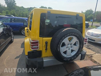 2011 Jeep Wrangler Unlimited Sahara - miniatura 5