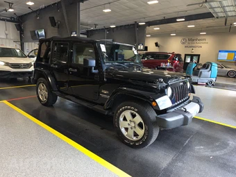 2011 Jeep Wrangler Unlimited Sahara – miniatura 3