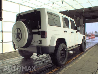 2011 Jeep Wrangler Unlimited Sahara - miniatura 4