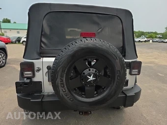 2011 Jeep Wrangler Unlimited Sport - miniatura 5