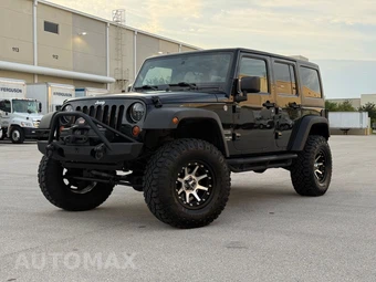 2011 Jeep Wrangler Unlimited Sport - car from the USA, Manheim Buy-Now listing at AUTOMAX
