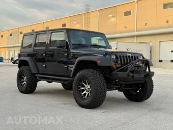 2011 Jeep Wrangler Unlimited Sport - miniatura 11
