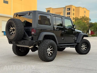 2011 Jeep Wrangler Unlimited Sport - miniatura 2