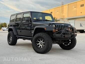 2011 Jeep Wrangler Unlimited Sport - miniatura 3