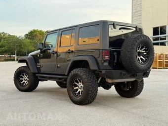 2011 Jeep Wrangler Unlimited Sport - miniatura 4