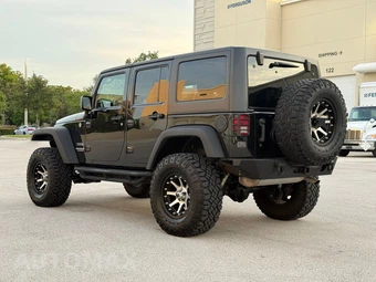 2011 Jeep Wrangler Unlimited Sport - miniatura 7