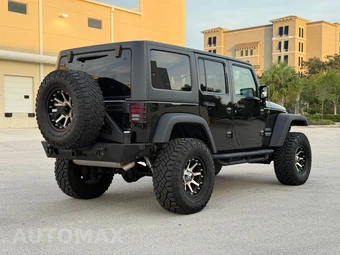 2011 Jeep Wrangler Unlimited Sport - miniatura 9