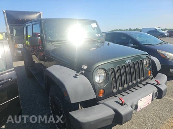 2011 Jeep Wrangler Unlimited Sport - miniatura 3