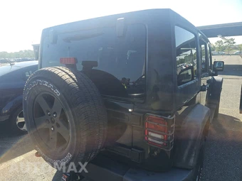 2011 Jeep Wrangler Unlimited Sport - miniatura 4