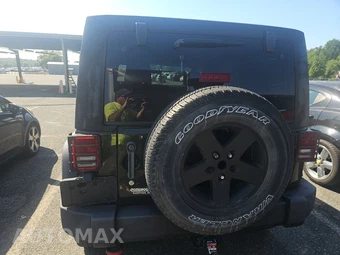 2011 Jeep Wrangler Unlimited Sport - miniatura 5