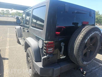 2011 Jeep Wrangler Unlimited Sport - miniatura 6