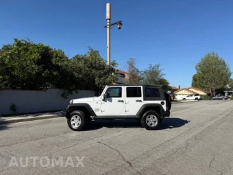 2011 Jeep Wrangler Unlimited Sport - car from the USA, Manheim Buy-Now listing at AUTOMAX