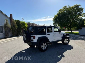 2011 Jeep Wrangler Unlimited Sport - miniatura 10