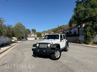 2011 Jeep Wrangler Unlimited Sport - miniatura 4