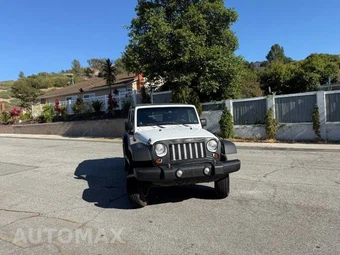 2011 Jeep Wrangler Unlimited Sport - miniatura 5