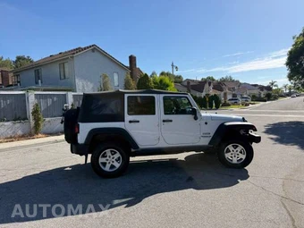 2011 Jeep Wrangler Unlimited Sport - miniatura 9