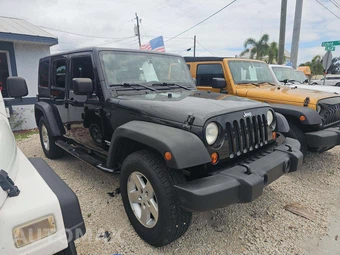 2011 Jeep Wrangler Unlimited Sport - miniatura 4