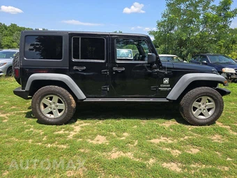 2011 Jeep Wrangler Unlimited Sport - miniatura 4