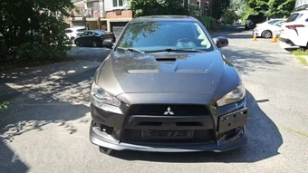 2011 Mitsubishi Lancer Evolution GSR - miniatura 2