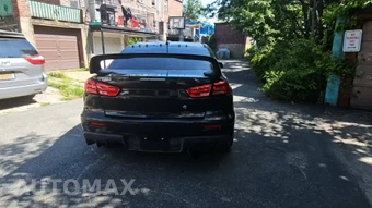 2011 Mitsubishi Lancer Evolution GSR - miniatura 4