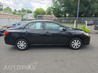 2011 Toyota Corolla LE - miniatura 4