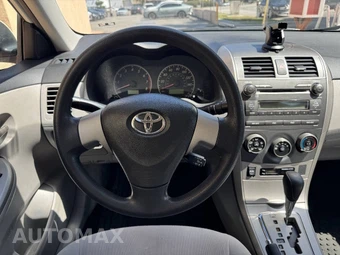 2011 Toyota Corolla LE - miniatura 10
