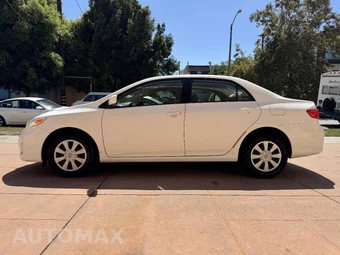 2011 Toyota Corolla LE - miniatura 4