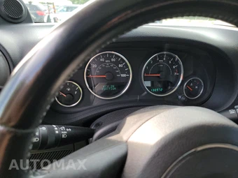 2012 Jeep Wrangler Sport - miniatura 12