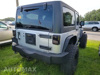 2012 Jeep Wrangler Sport - miniatura 4