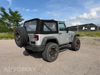 2012 Jeep Wrangler Sport - miniatura 5