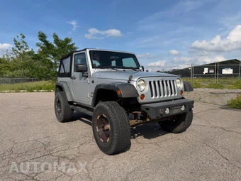 2012 Jeep Wrangler Sport - miniatura 7