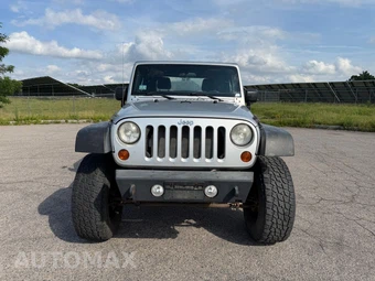 2012 Jeep Wrangler Sport - miniatura 8