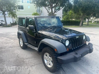2012 Jeep Wrangler Sport - miniatura 2
