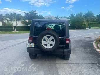 2012 Jeep Wrangler Sport - miniatura 4