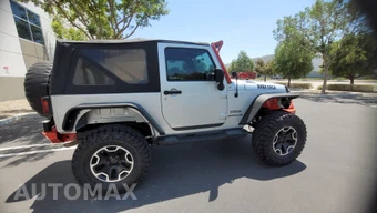 2012 Jeep Wrangler Sport - miniatura 4