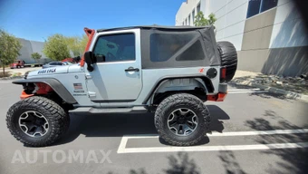 2012 Jeep Wrangler Sport - miniatura 5