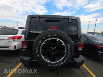 2012 Jeep Wrangler Unlimited Altitude Edition - miniatura 5