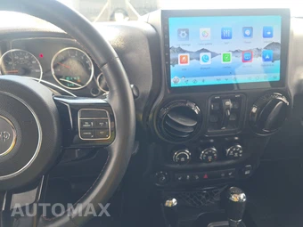 2012 Jeep Wrangler Unlimited Altitude Edition - miniatura 11