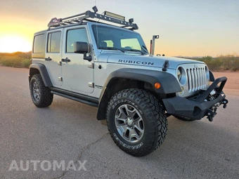 2012 Jeep Wrangler Unlimited Rubicon - miniatura 7