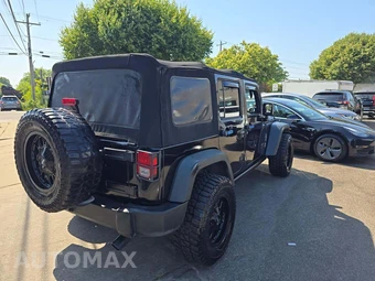 2012 Jeep Wrangler Unlimited Rubicon - miniatura 3