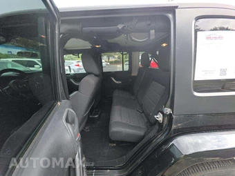 2012 Jeep Wrangler Unlimited Sahara - miniatura 10
