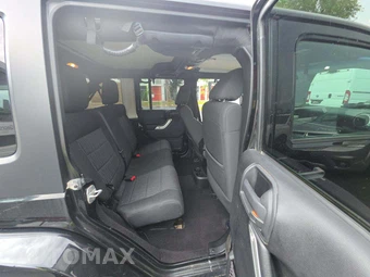 2012 Jeep Wrangler Unlimited Sahara - miniatura 13